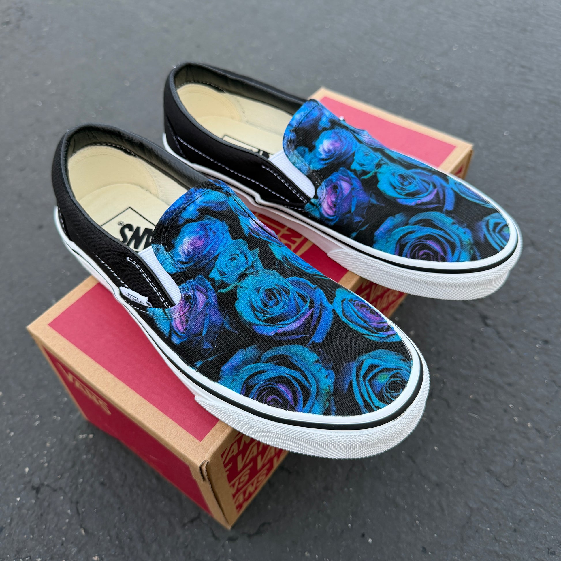 blue and purple roses on custom slip on Vans shoes