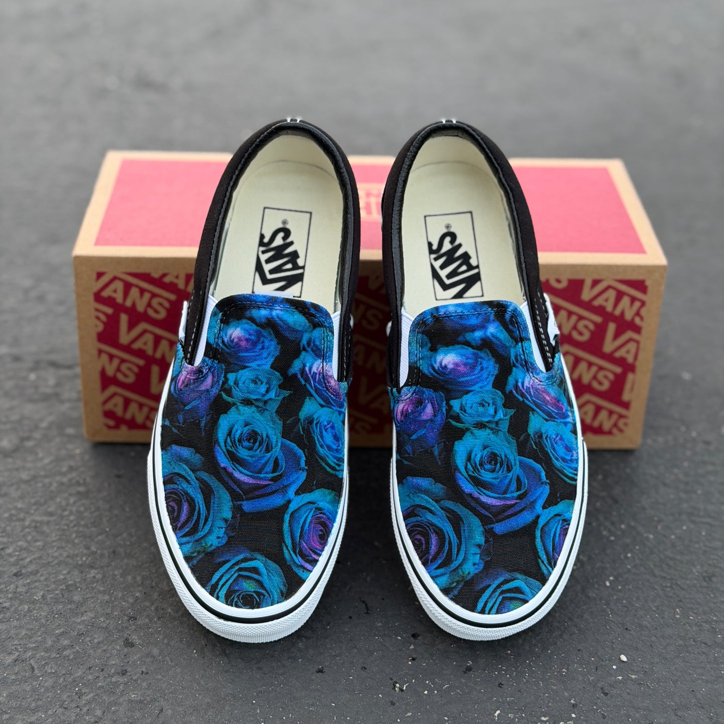 blue and purple roses on custom slip on Vans shoes