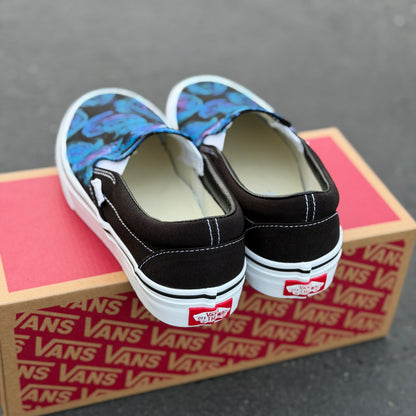 blue and purple roses on custom slip on Vans shoes