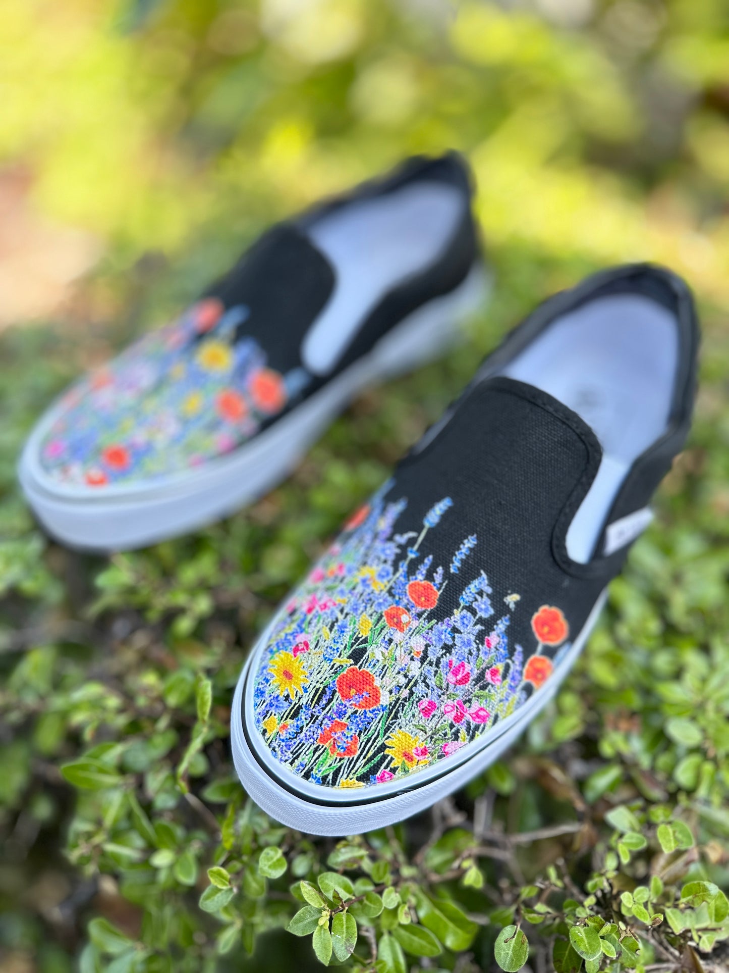 Black Slip On Shoes with Bohemian Inspired Wild Flowers on BLVD Original Slip On Shoes for Men and Women