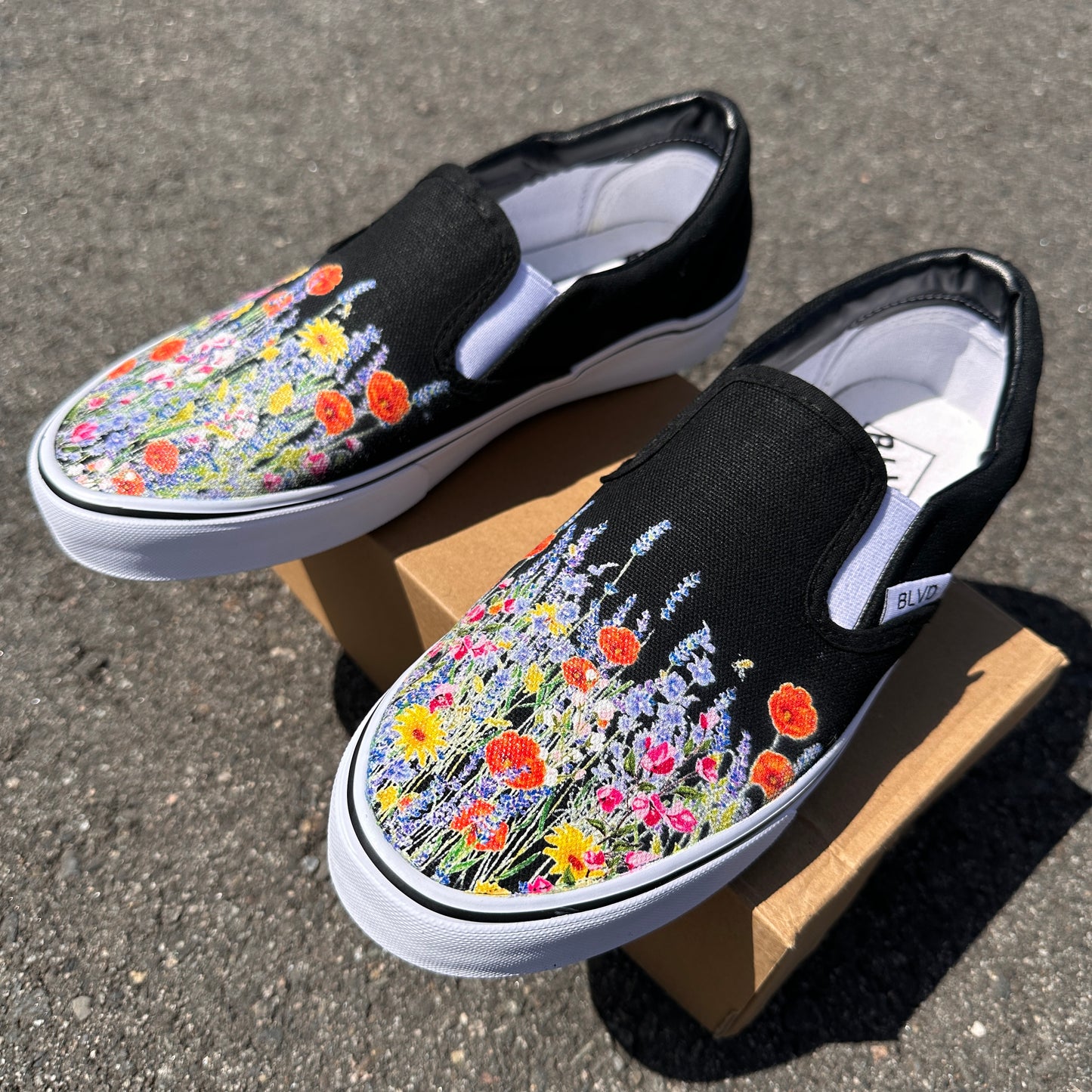 Black Slip On Shoes with Bohemian Inspired Wild Flowers on BLVD Original Slip On Shoes for Men and Women