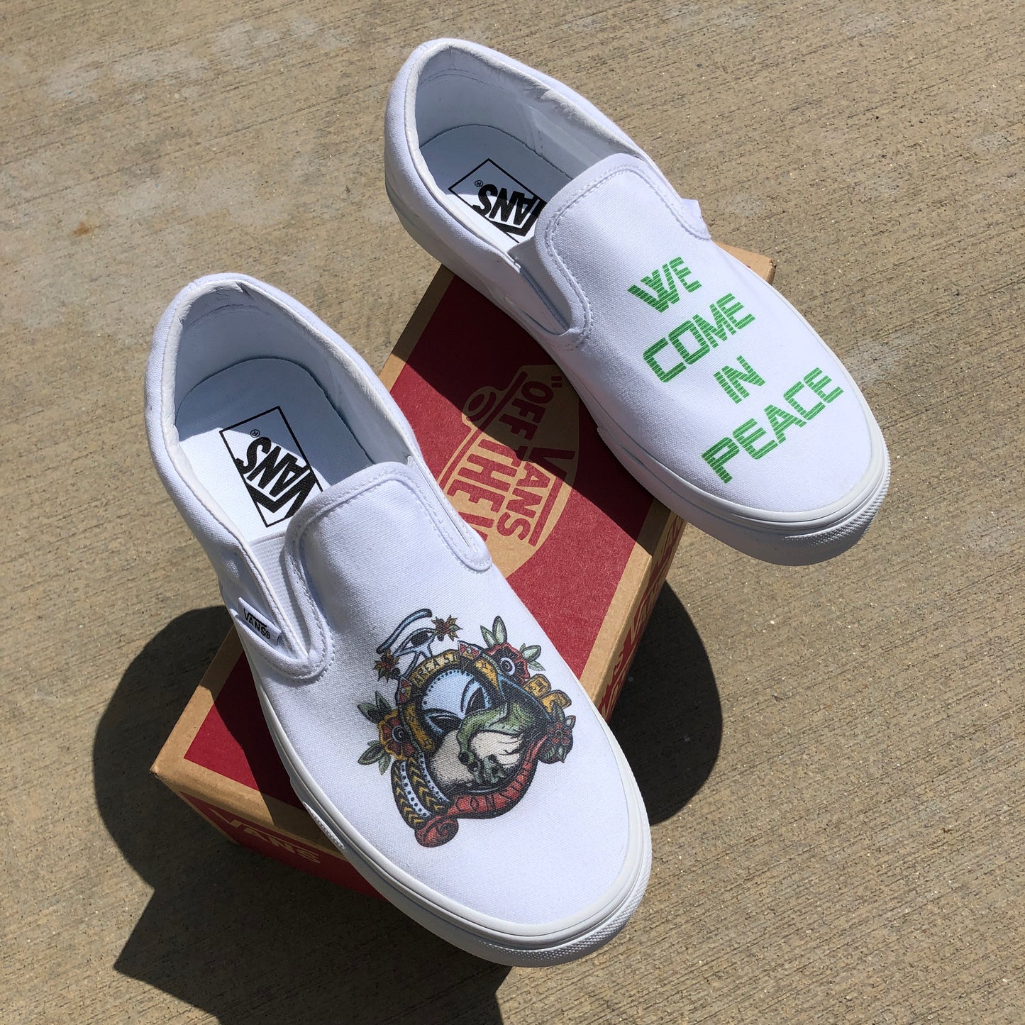 We Come in Peace White Slip-On Vans